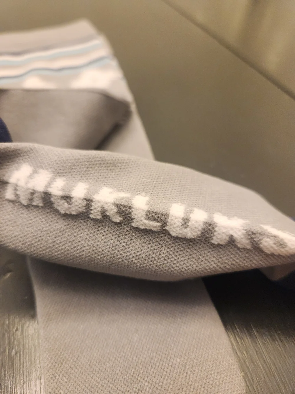 Muk Luks Gray Knee-High Socks with Navy Accents and Light Blue Stripes